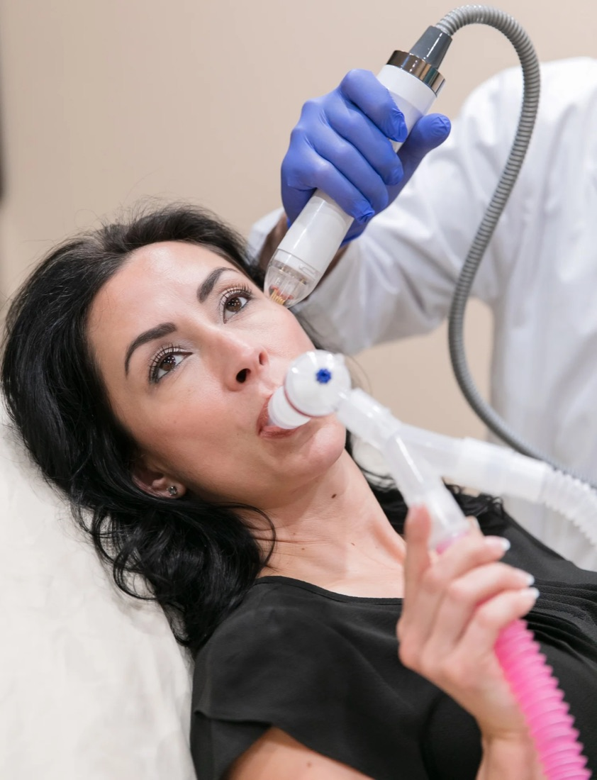 Patient self-administering Pro-Nox during a treatment